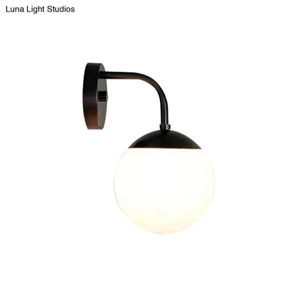 Minimalist black & gold wall light with milky glass ball for bedroom