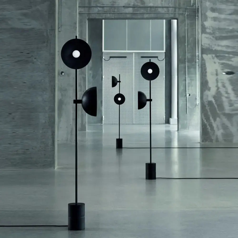 Minimalist black marble floor lamp with funnel shade living room