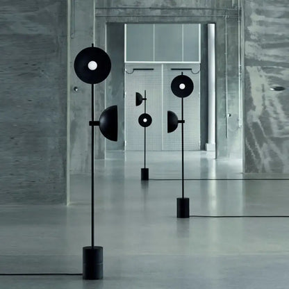 Minimalist black marble floor lamp with funnel shade living room