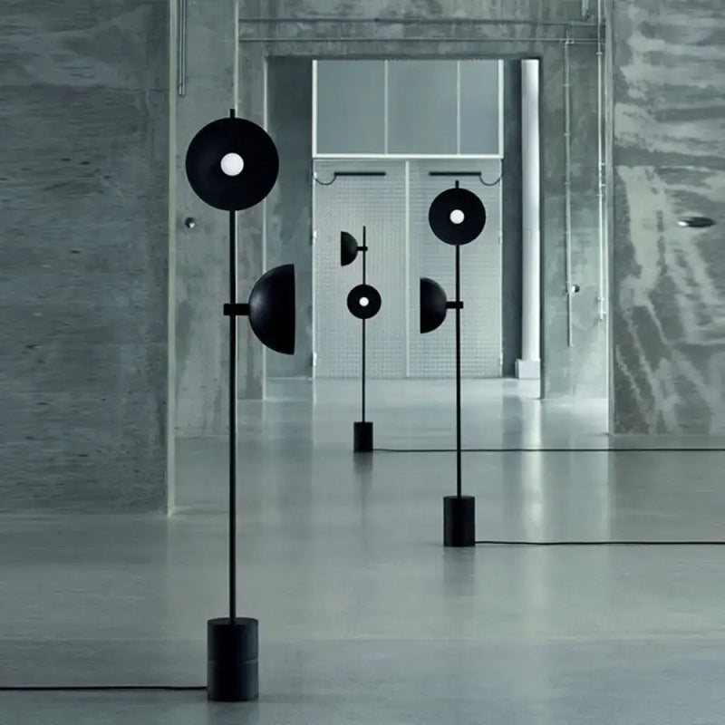 Minimalist black marble floor lamp with funnel shade living room