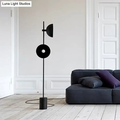 Minimalist black marble floor lamp with funnel shade living room