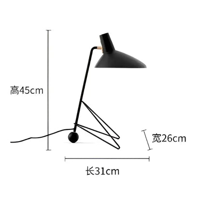 Minimalist black metal tripod desk lamp for bedroom or office