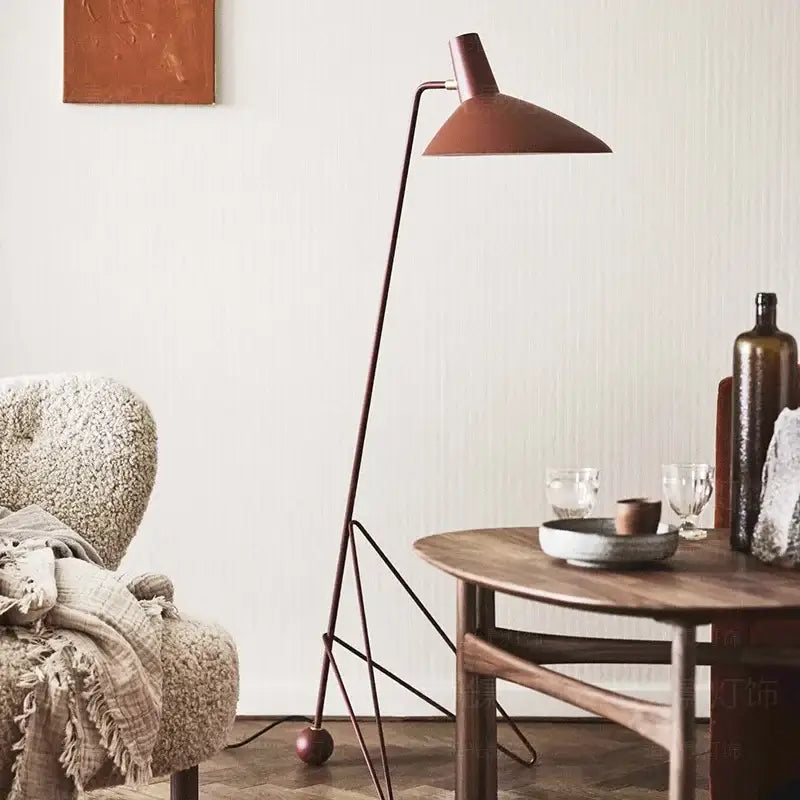 Minimalist black metal tripod desk lamp for bedroom or office
