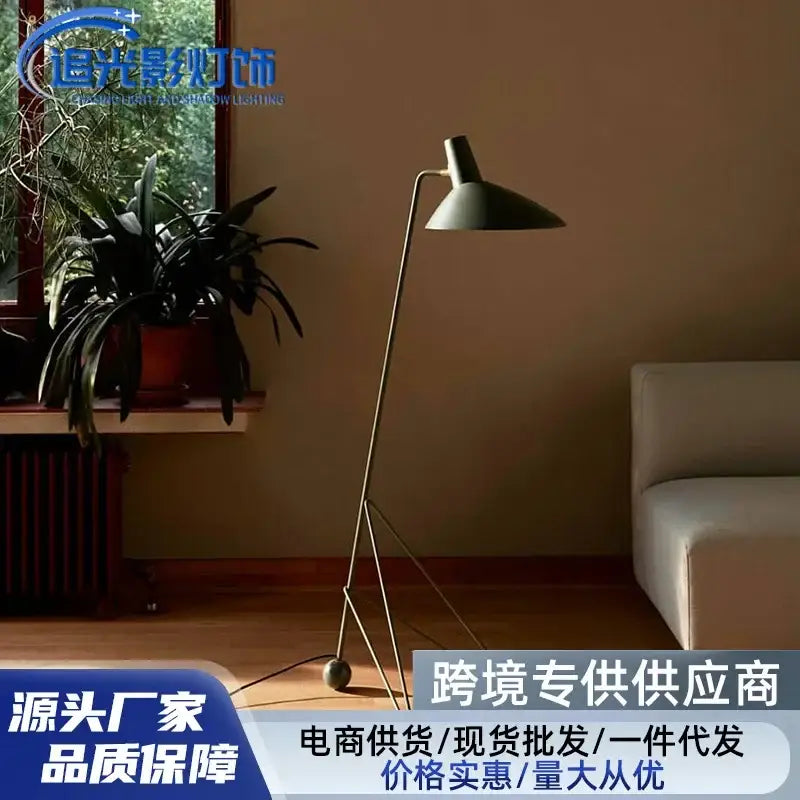 Minimalist black metal tripod desk lamp for bedroom or office