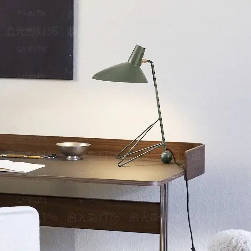 Minimalist black metal tripod desk lamp for bedroom or office