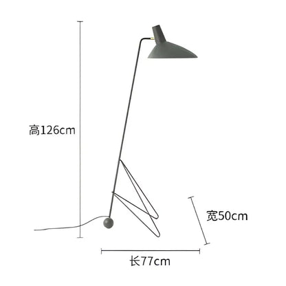 Minimalist black metal tripod desk lamp for bedroom or office