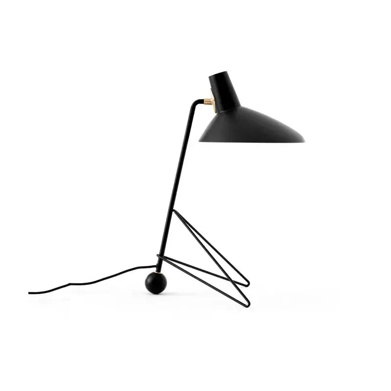 Minimalist black metal tripod desk lamp for bedroom or office