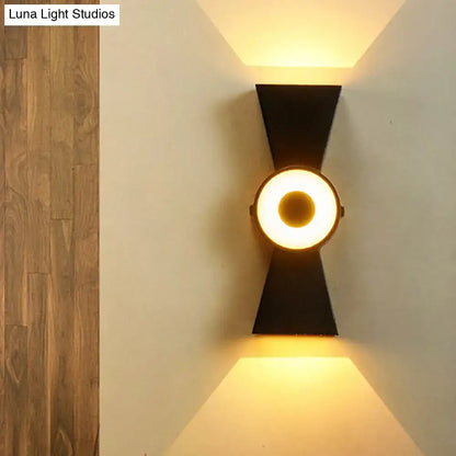 Minimalist black metal wall sconce warm white light bedroom fixture