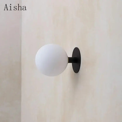 Minimalist black wall lamp with white glass globe bedroom lighting fixture