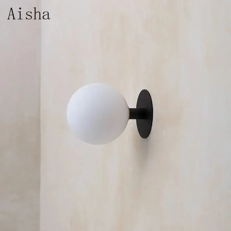 Minimalist black wall lamp with white glass globe bedroom lighting fixture