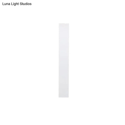 Minimalist black & white aluminum shade direct wired sconce bedroom