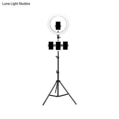 Minimalist black & white mobile phone holder with ring light bedroom
