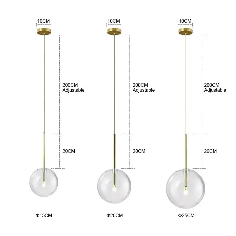 Minimalist brass and clear glass ball pendant light for dining room