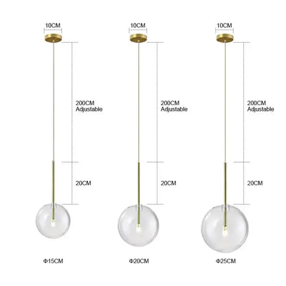 Minimalist brass and clear glass ball pendant light for dining room