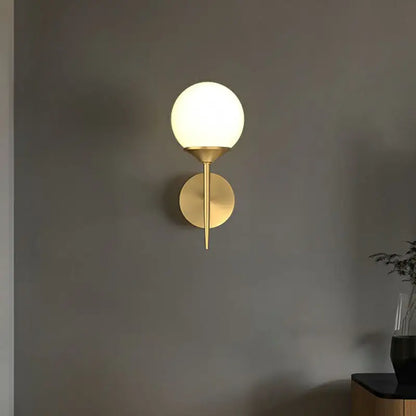 Minimalist brass and frosted glass led wall lamp for dining room