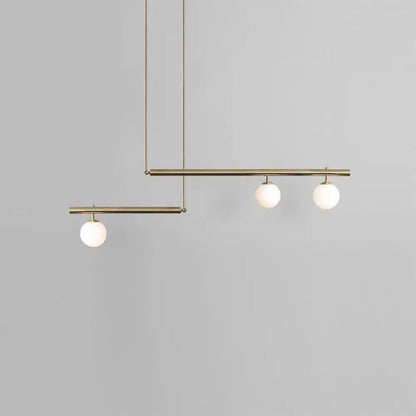 Minimalist brass and white glass ceiling light for kitchen island