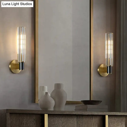 Minimalist brass finish tubular wall light sconce for bedroom