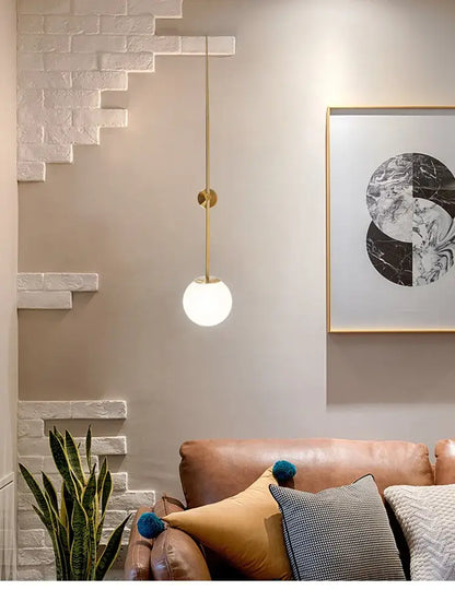 Minimalist brass led wall lights with frosted globe for bedroom