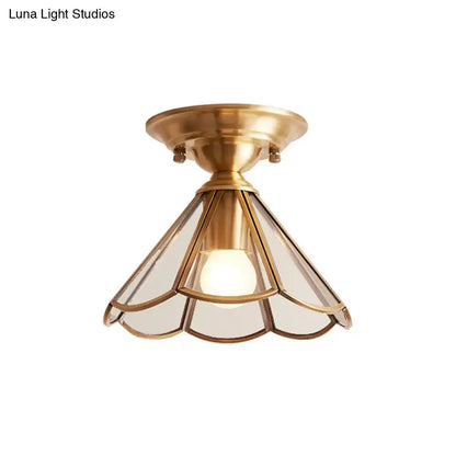 Minimalist brass scalloped single bulb flush mount bedroom light