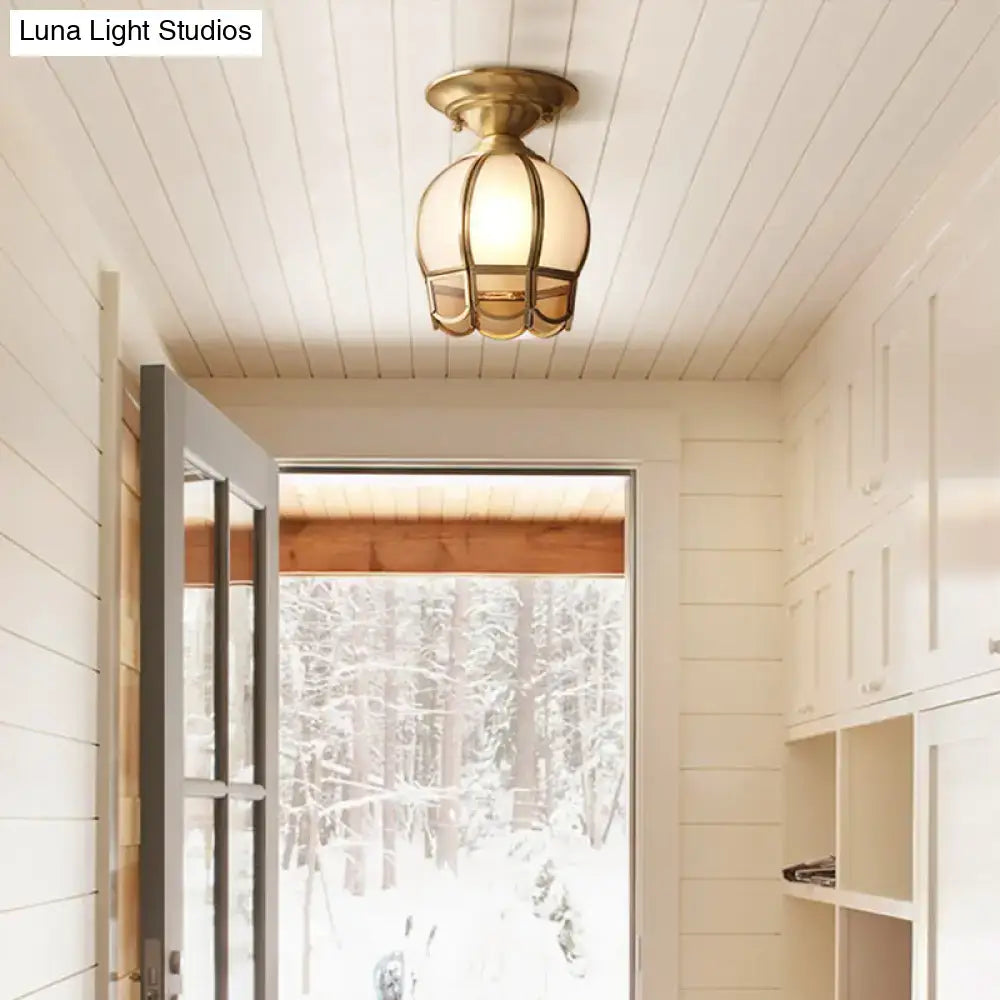 Minimalist brass scalloped single bulb flush mount bedroom light