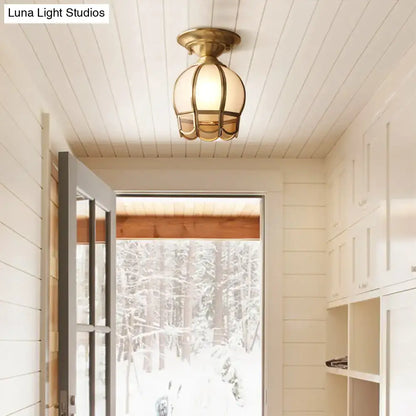 Minimalist brass scalloped single bulb flush mount bedroom light