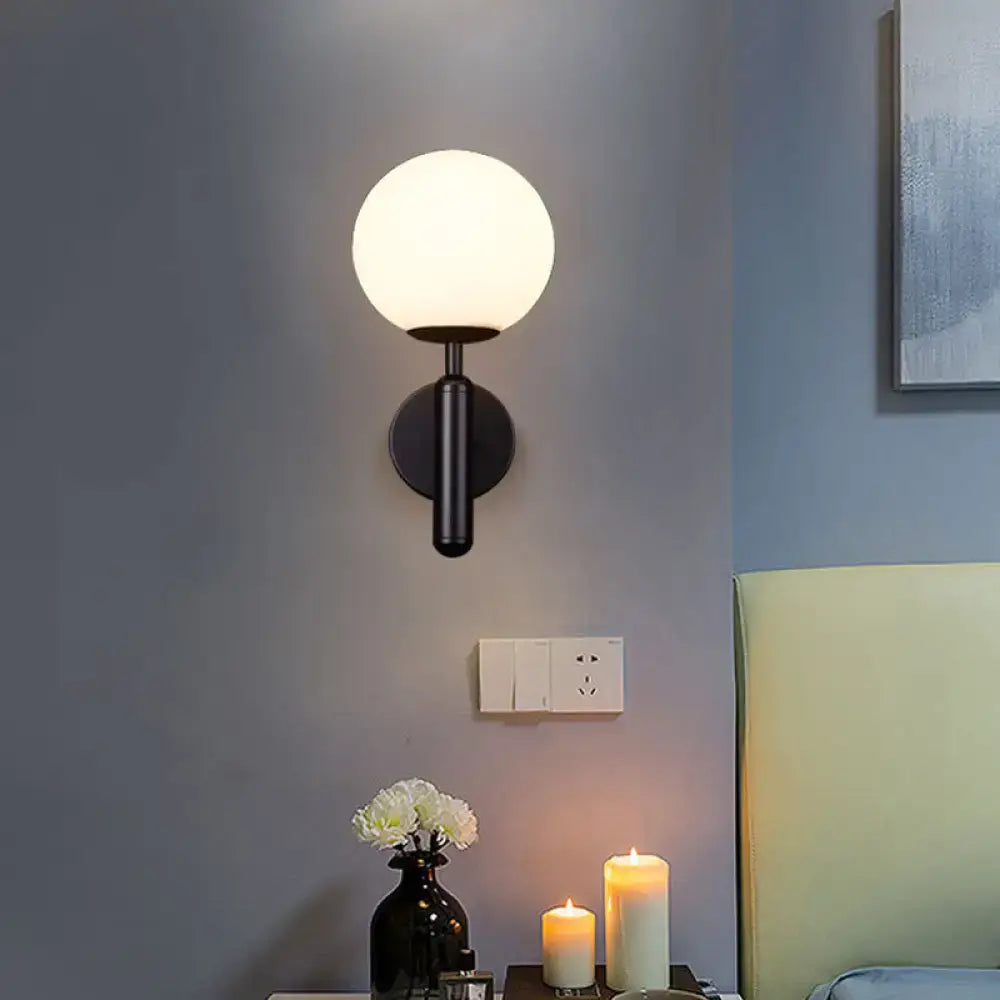 Minimalist brass textured glass globe wall mount light for bedroom