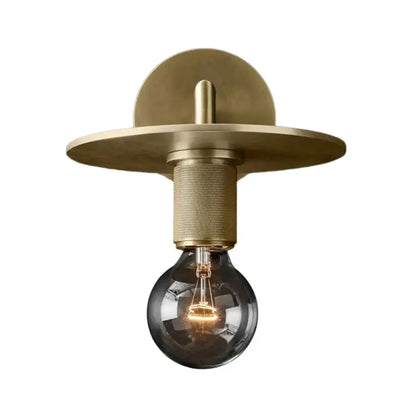 Minimalist bronze wall sconce with glass shade bedroom light