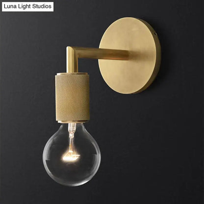 Minimalist bronze wall sconce with glass shade bedroom light