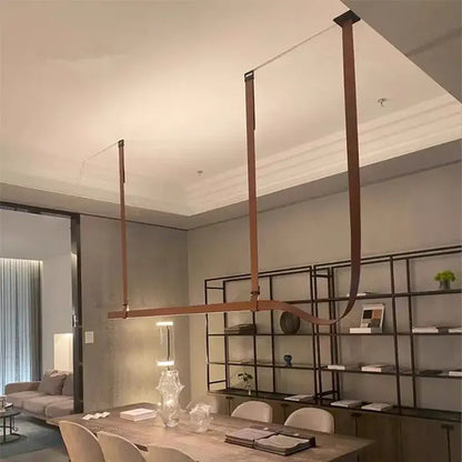 Minimalist brown leather hanging clothes drying rack bedroom decor