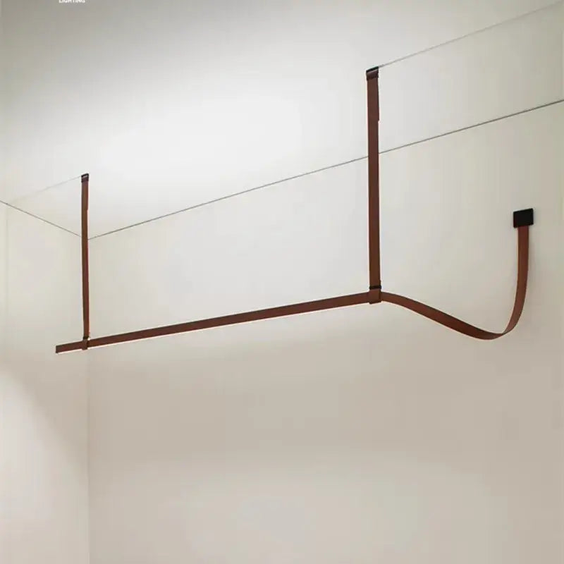 Minimalist brown leather hanging clothes drying rack bedroom decor