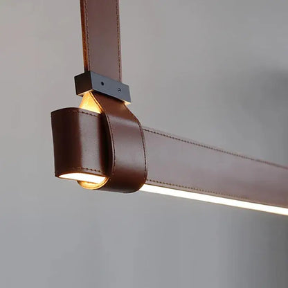 Minimalist brown leather hanging clothes drying rack bedroom decor