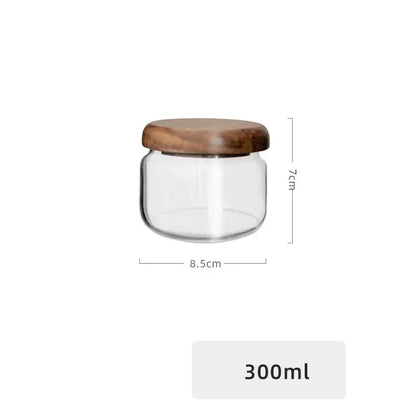 Minimalist clear glass kitchen storage jar with acacia wood lid
