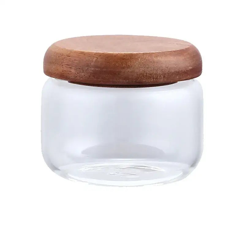 Minimalist clear glass kitchen storage jar with acacia wood lid