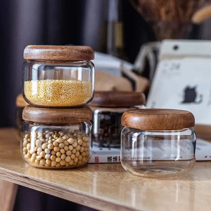 Minimalist clear glass kitchen storage jar with acacia wood lid