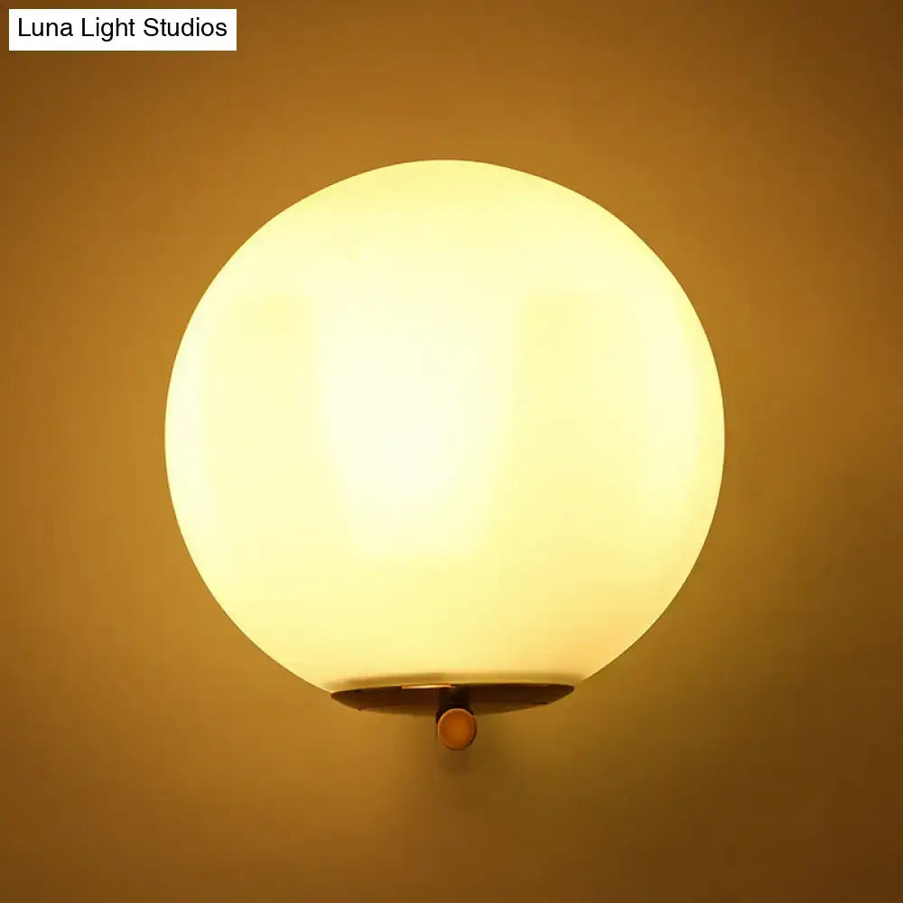 Minimalist gold and frosted white glass ball wall light bedroom sconce