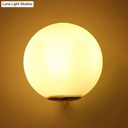 Minimalist gold and frosted white glass ball wall light bedroom sconce