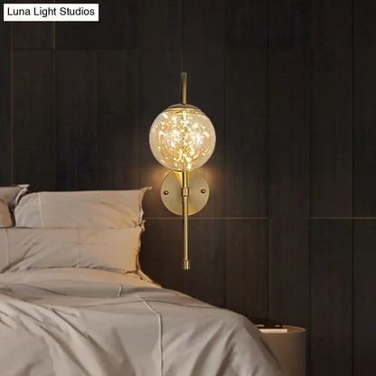 Minimalist gold gooseneck wall light with fairy light globe bedroom