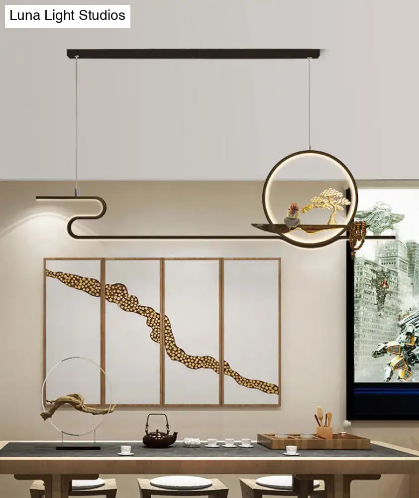 Minimalist gold linear hanging lamp study room bonsai tree design