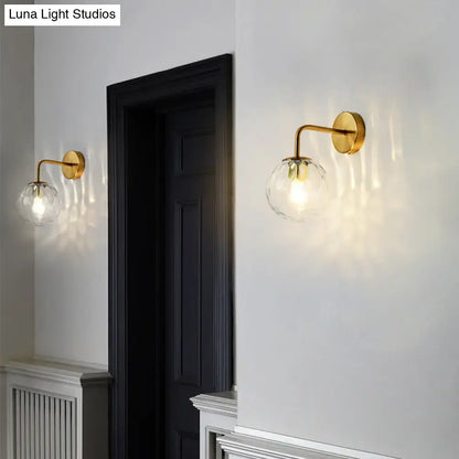 Minimalist gold rippled glass sphere wall lamp for bedroom