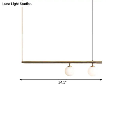 Minimalist golden glass sphere pendant light dining room