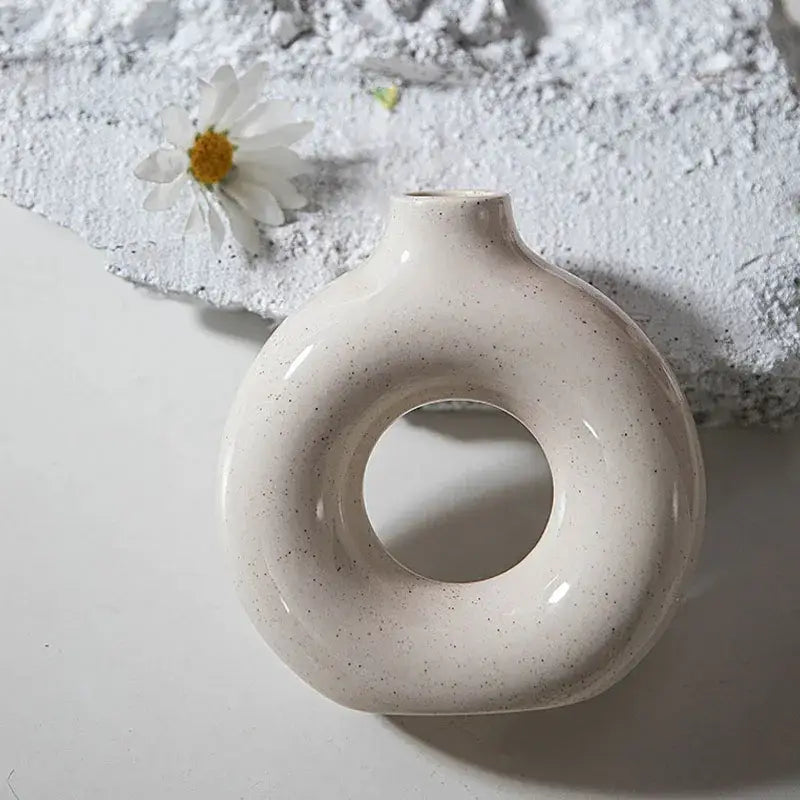 Minimalist speckled off-white ceramic donut candle holder dining room