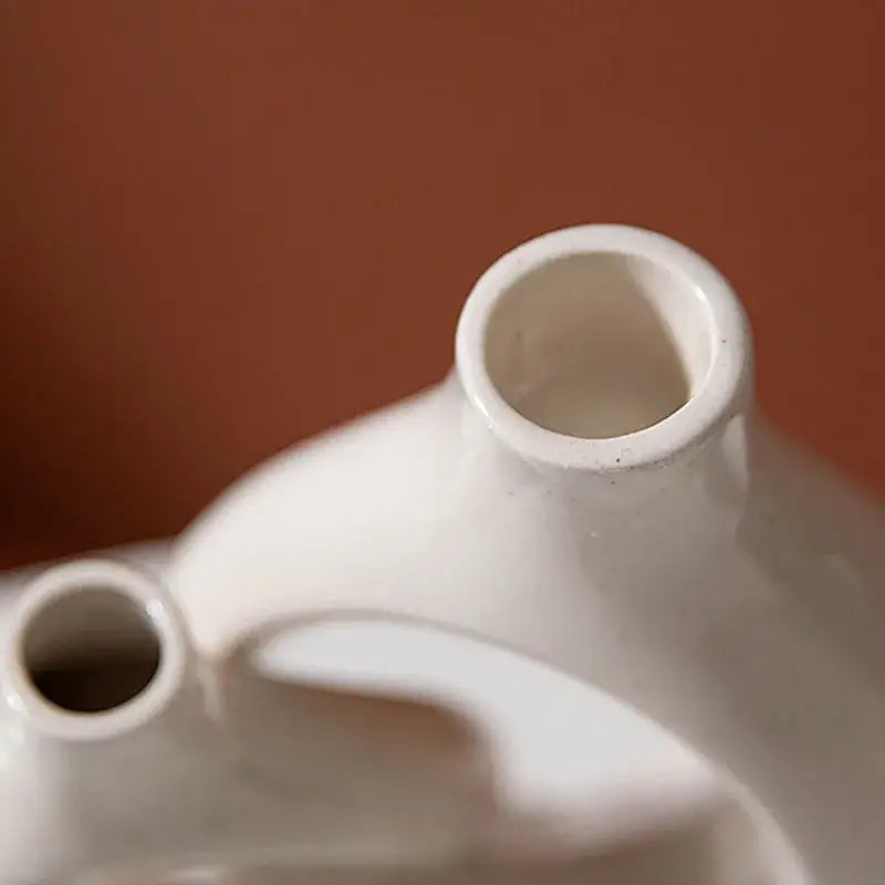 Minimalist speckled off-white ceramic donut candle holder dining room