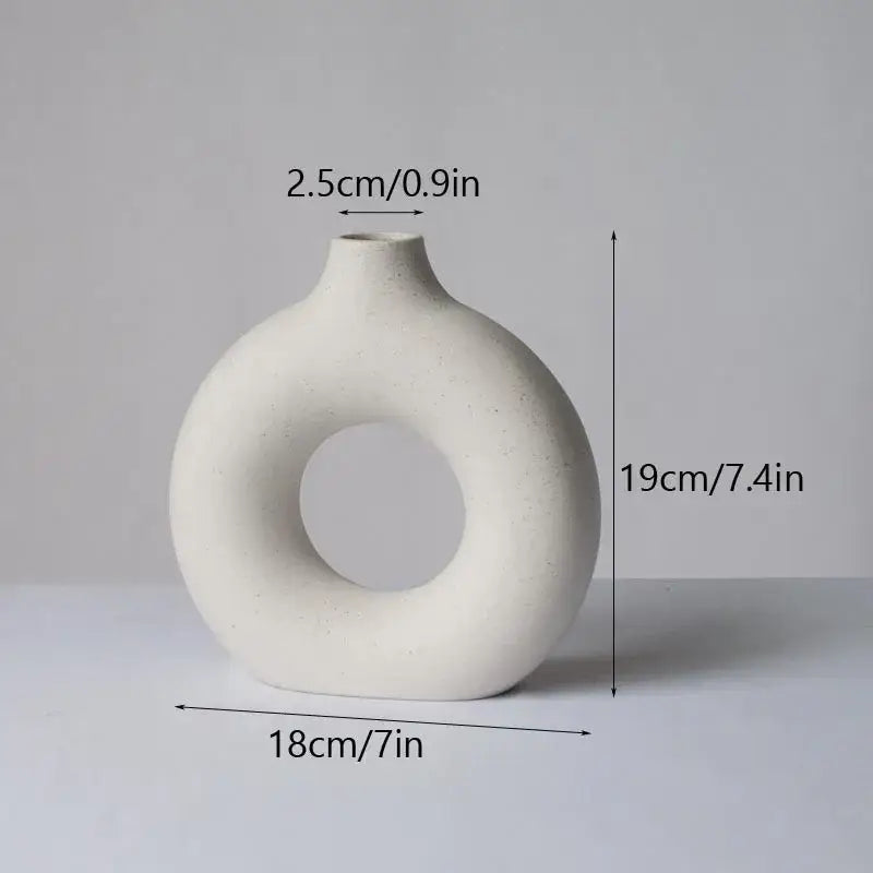 Minimalist white ceramic donut vase set living room