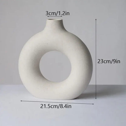 Minimalist white ceramic donut vase set living room