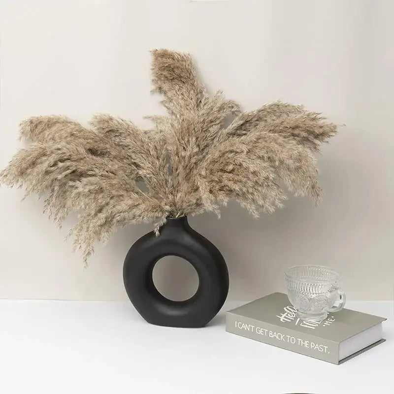 Minimalist white ceramic donut vase set living room