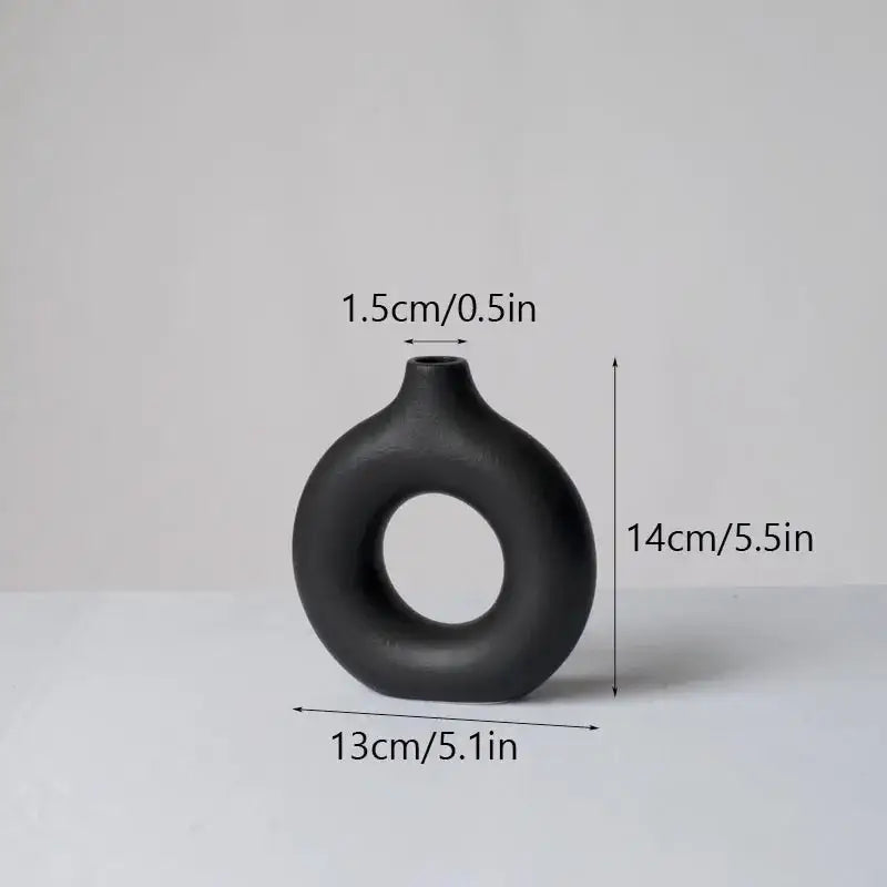Minimalist white ceramic donut vase set living room