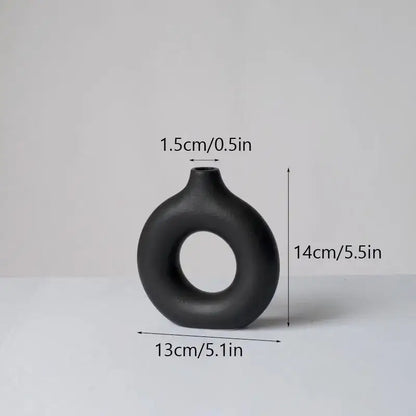 Minimalist white ceramic donut vase set living room