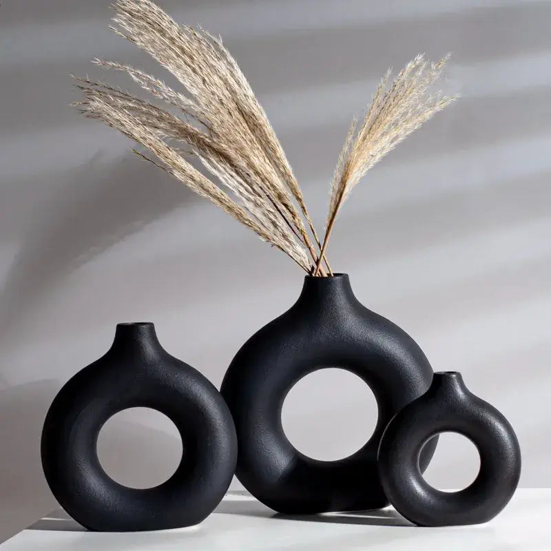Minimalist white ceramic donut vase set living room