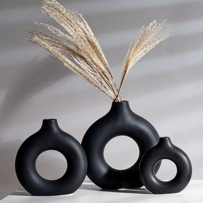 Minimalist white ceramic donut vase set living room