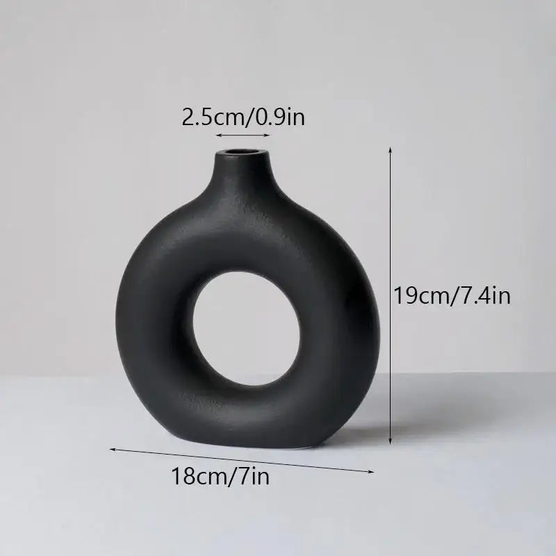 Minimalist white ceramic donut vase set living room